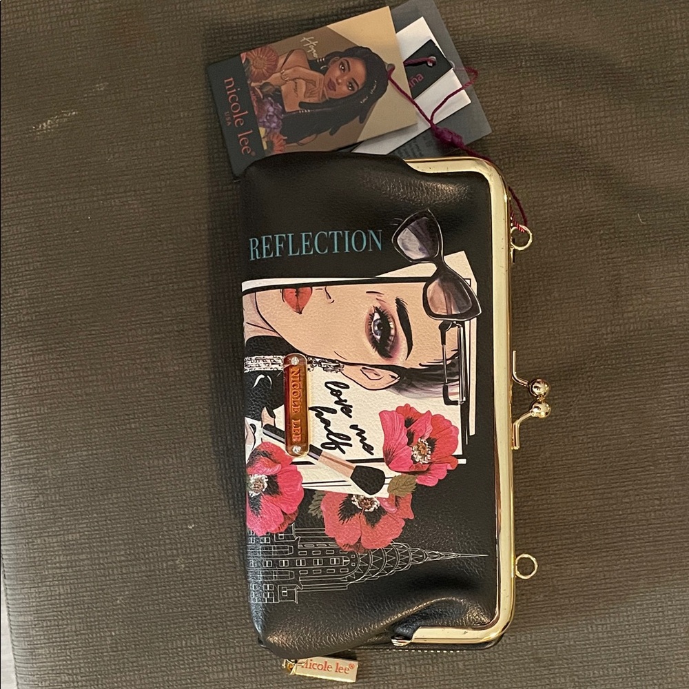 Nicole Lee Black and Pink Wristlet with Floral Design